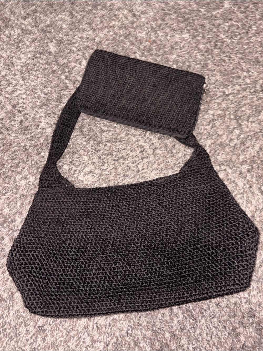 The Sak Black Crochet Shoulder Bag with Detachable Zip Pouch